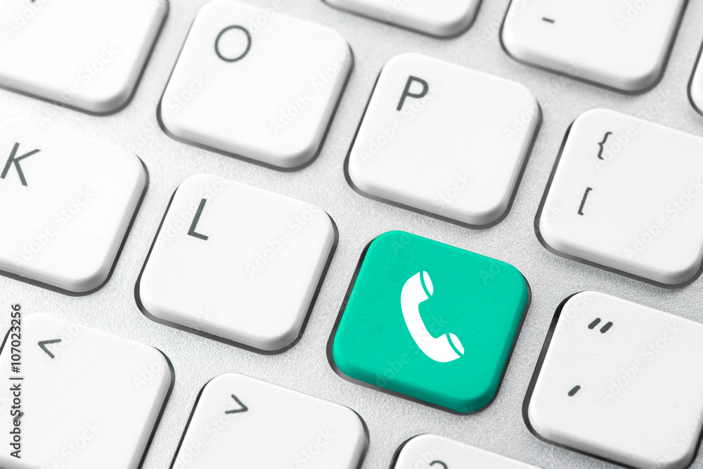 Email ,telephone, & contact us icon on computer keyboard Email ,telephone, & contact us icon on computer keyboard