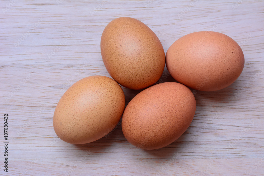 Fresh eggs on wooden background Fresh eggs on wooden background