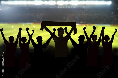 Photography silhouettes of Soccer fans in a match and Spectators at football