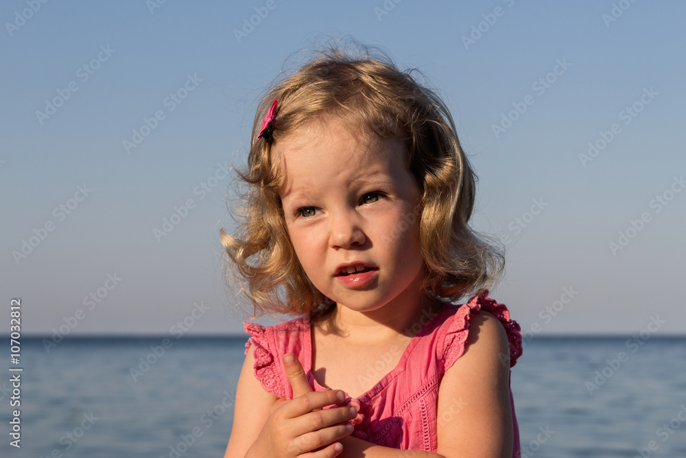 Happy, funny little girl on the sea. Happy, funny little girl on the sea.