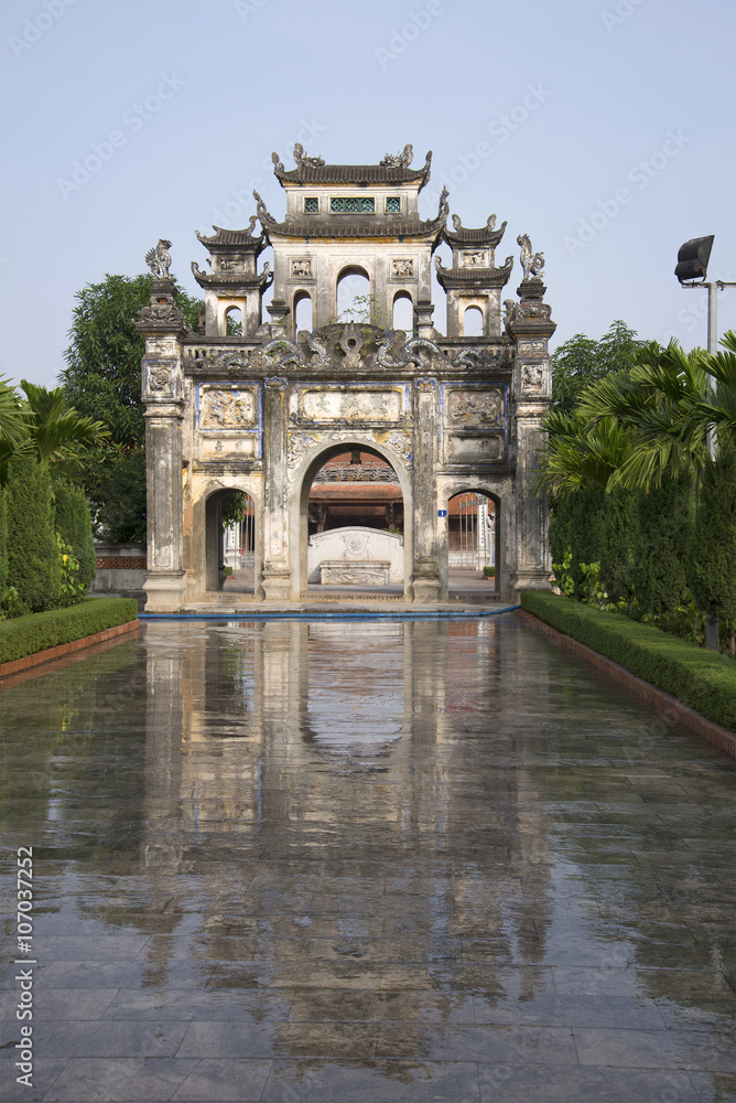 The gate of a Buddhist temple in Snake village (Le Mat) early in the morning. Vietnam The gate of a Buddhist temple in Snake village (Le Mat) early in the morning. Vietnam