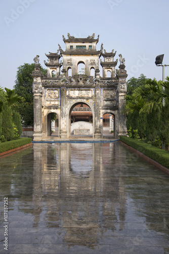 The gate of a Buddhist temple in Snake village (Le Mat) early in the morning. Vietnam