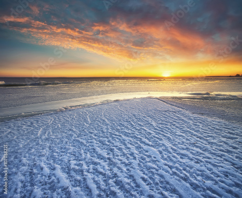 Winter sea during sundown. Beautiful winter seascape