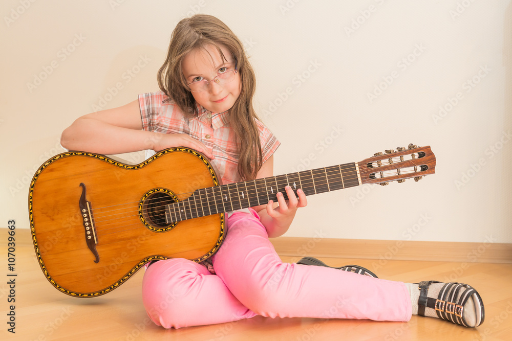 Girl with russian seven-string acoustic guitar Girl with russian seven-string acoustic guitar