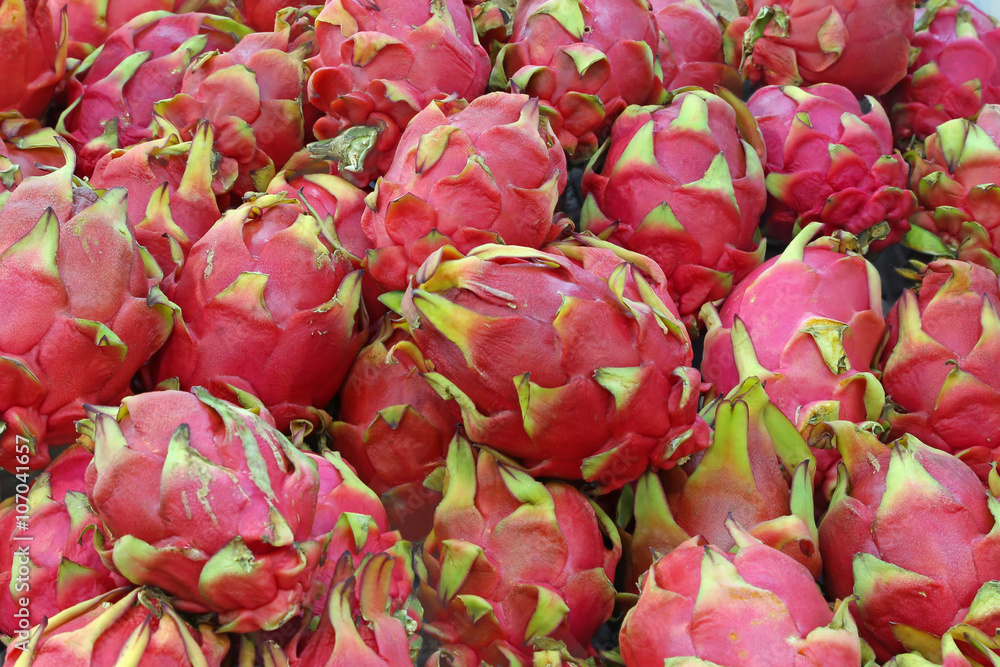 Red pitahaya at a farmers market Red pitahaya at a farmers market