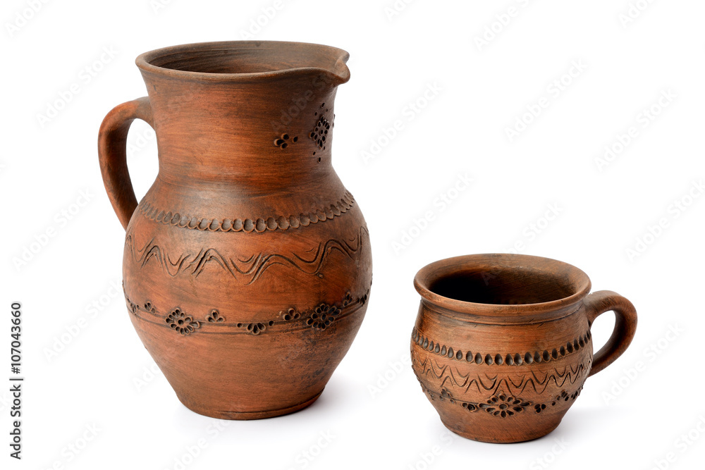 clay jug and mug isolated on white background