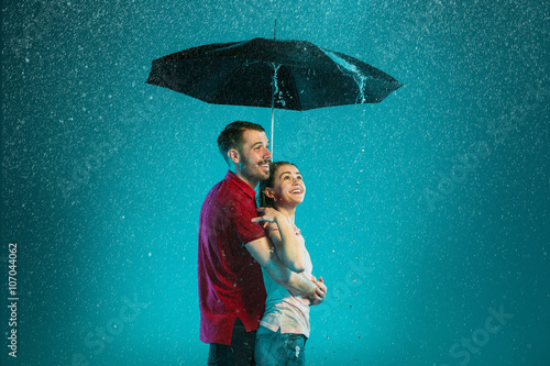 The loving couple in the rain