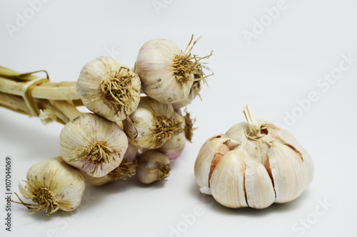 bundle of garlic on white background 