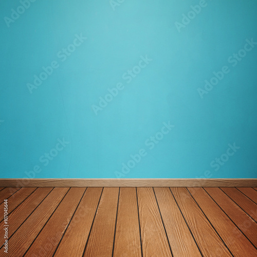 room interior with concrete wall and brown wood floor