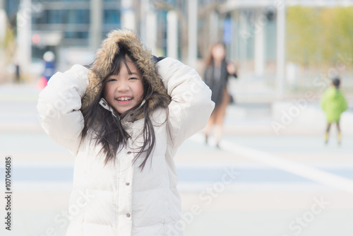 Beautiful asian girl in winter coat