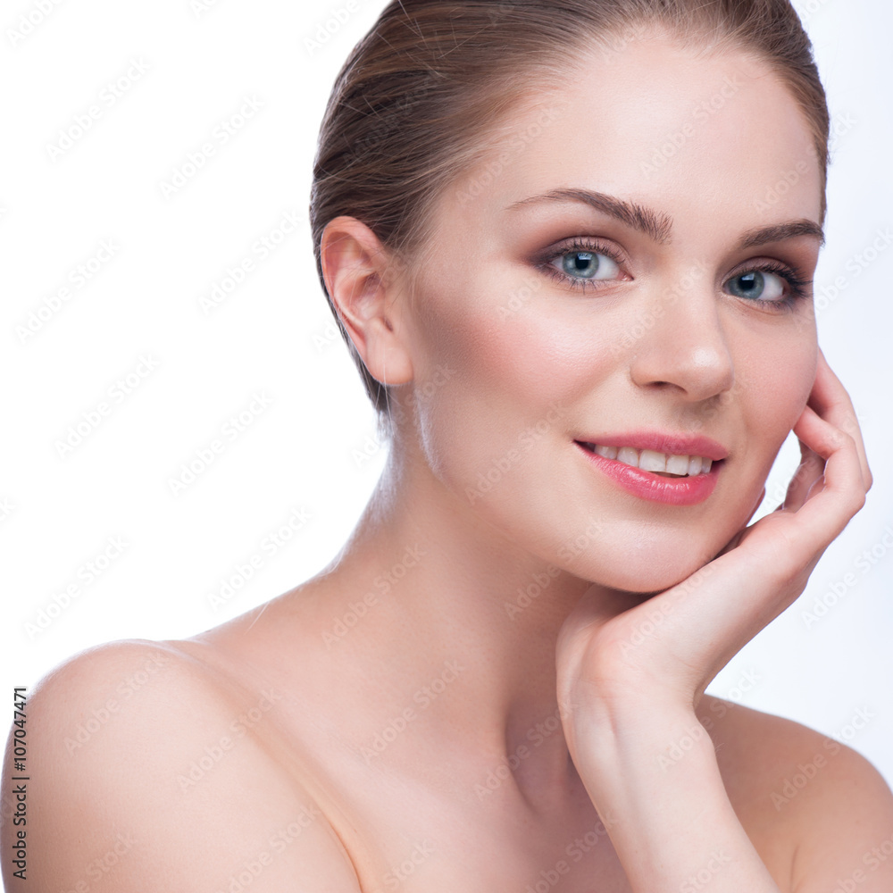 Pretty face of beautiful smiling woman - posing at studio isolated on white Pretty face of beautiful smiling woman - posing at studio isolated on white