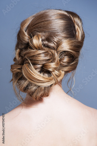Beauty hair. Hairstyle back view isolated on gray