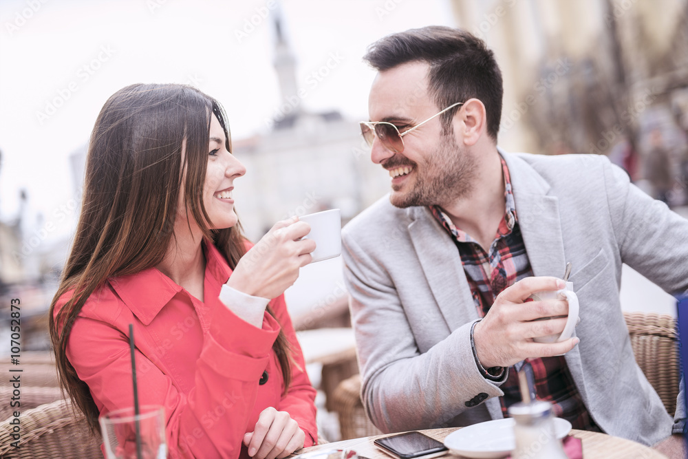 Couple having a cup of coffee on a date Couple having a cup of coffee on a date