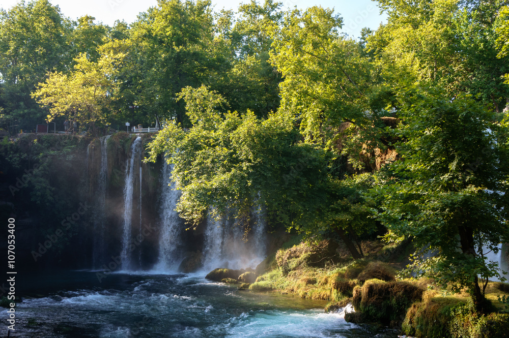 Fototapeta premium Duden waterfall in Antalya, Turkey. Waterfall surrounded by forest. Waterfall streem.