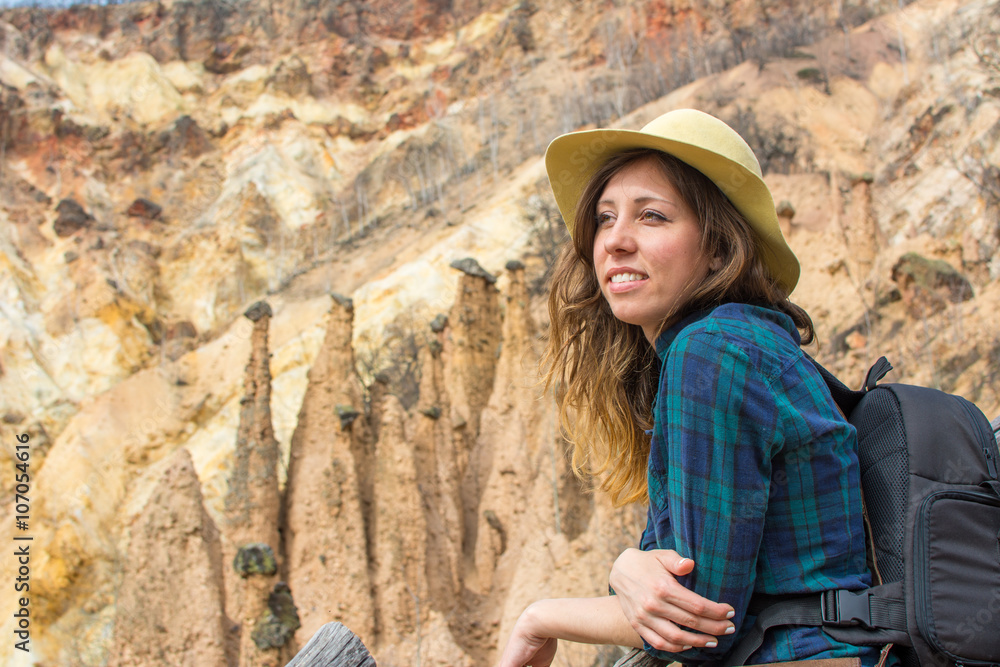 Woman hiker with backpack outdoors Woman hiker with backpack outdoors