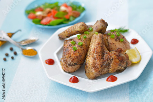 Appetizing fried chicken on a white plate