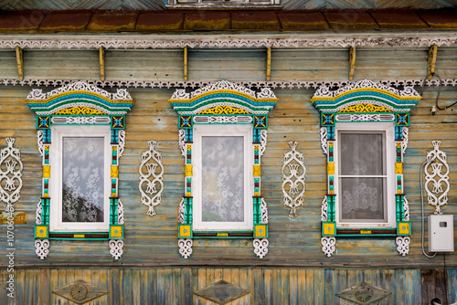 Carved window in old russian wooden country house