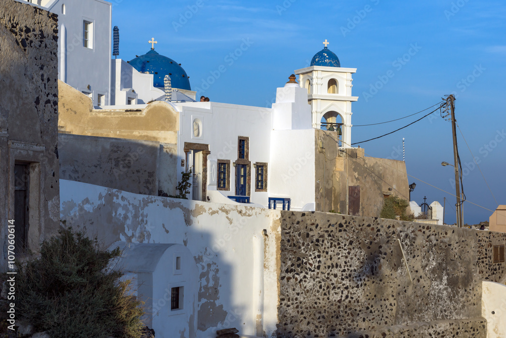 Fototapeta premium White house and churches in town of Imerovigli, Santorini island, Thira, Cyclades, Greece