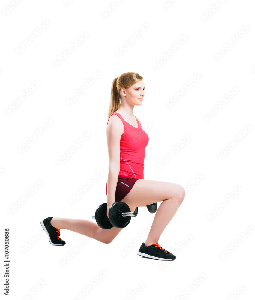 Fit woman in sportswear doing physical exercises Fit woman in sportswear doing physical exercises