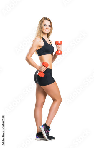 Fit, healthy and sporty woman in sportswear isolated on white