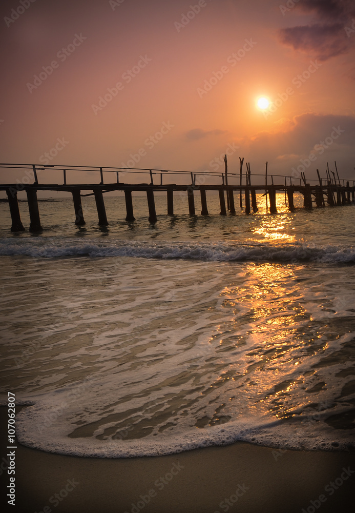 Old wood pier, sunset, Koh Samet island, Thailand