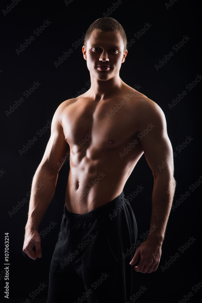 Fototapeta premium Strong, fit and sporty bodybuilder man