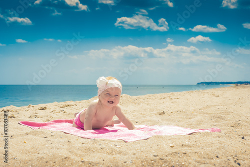 Baby on a beach 3