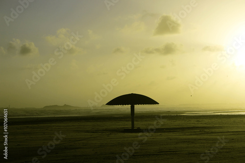 Empty and clean umbrella beach of Clifton during sunset © Aleemzahidkhan