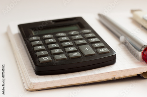 Business Concept with calculator, notebook
