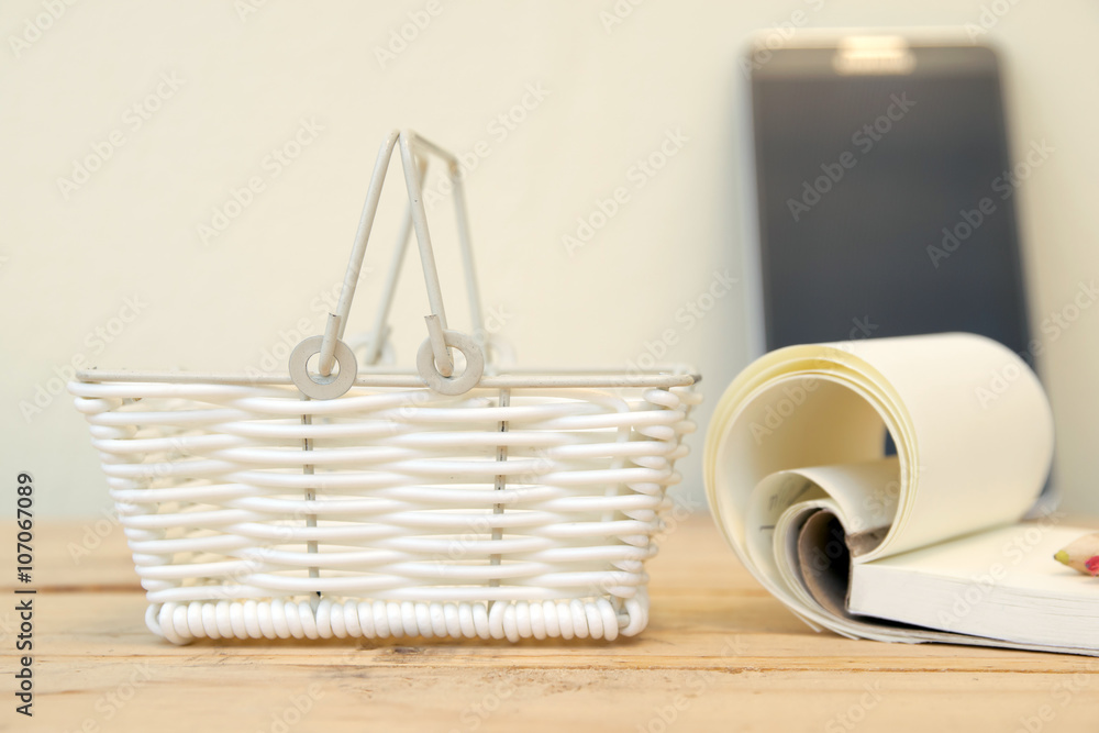 Obraz premium shopping cart with mobile phone online shopping concept
