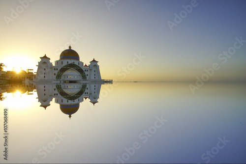 Majestic view of Malacca Straits Mosque during sunset With copyspace area