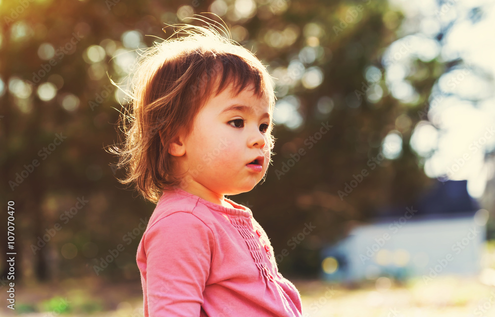 Toddler girl playing outside Toddler girl playing outside