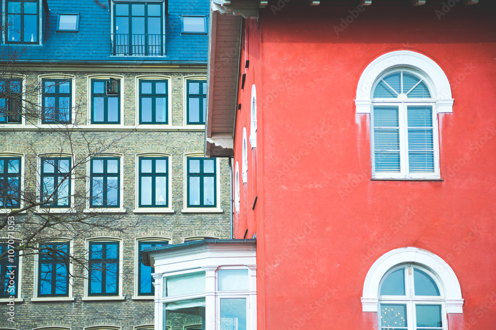 red and blue typical colors of nordic building with window detai