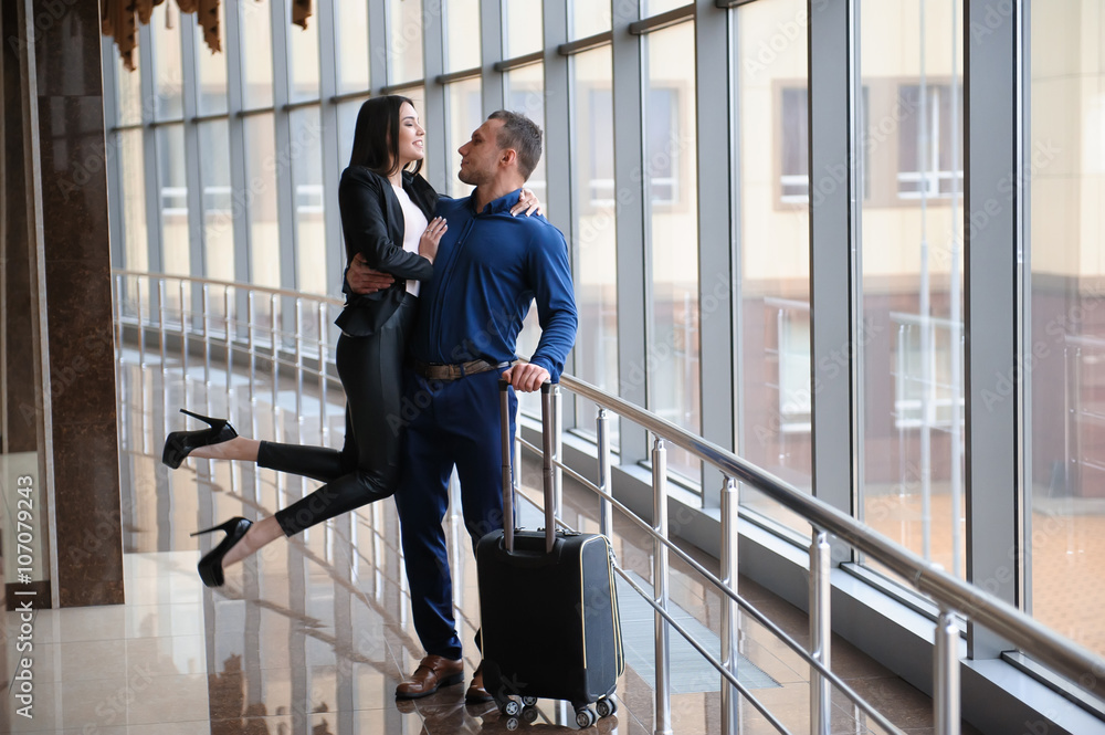 Business finance team young attractive members at the airport or Business finance team young attractive members at the airport or