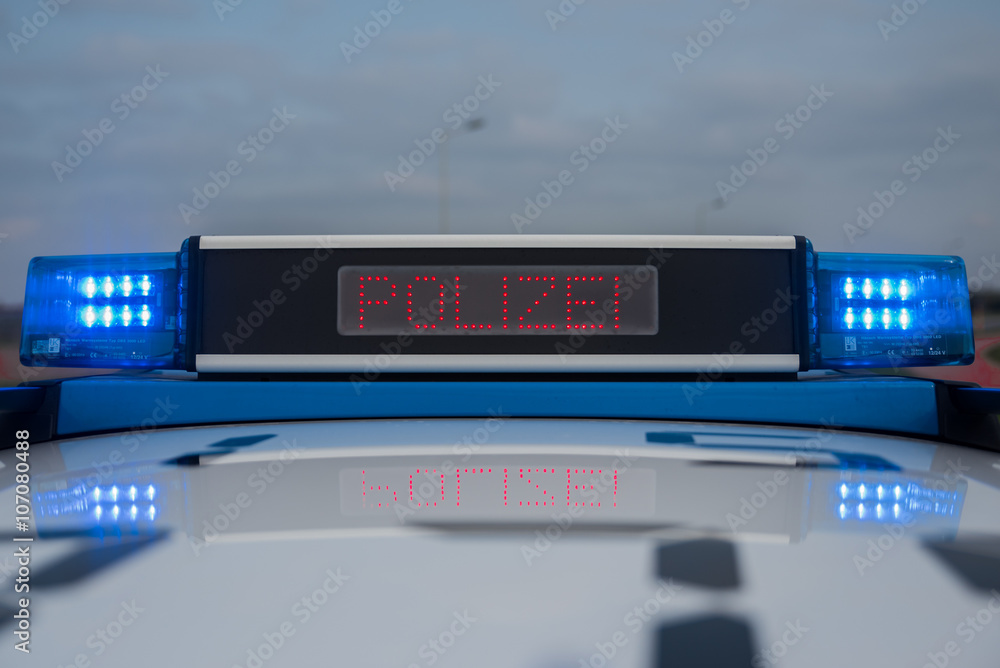 Blaulicht Polizei folgen Schriftzug