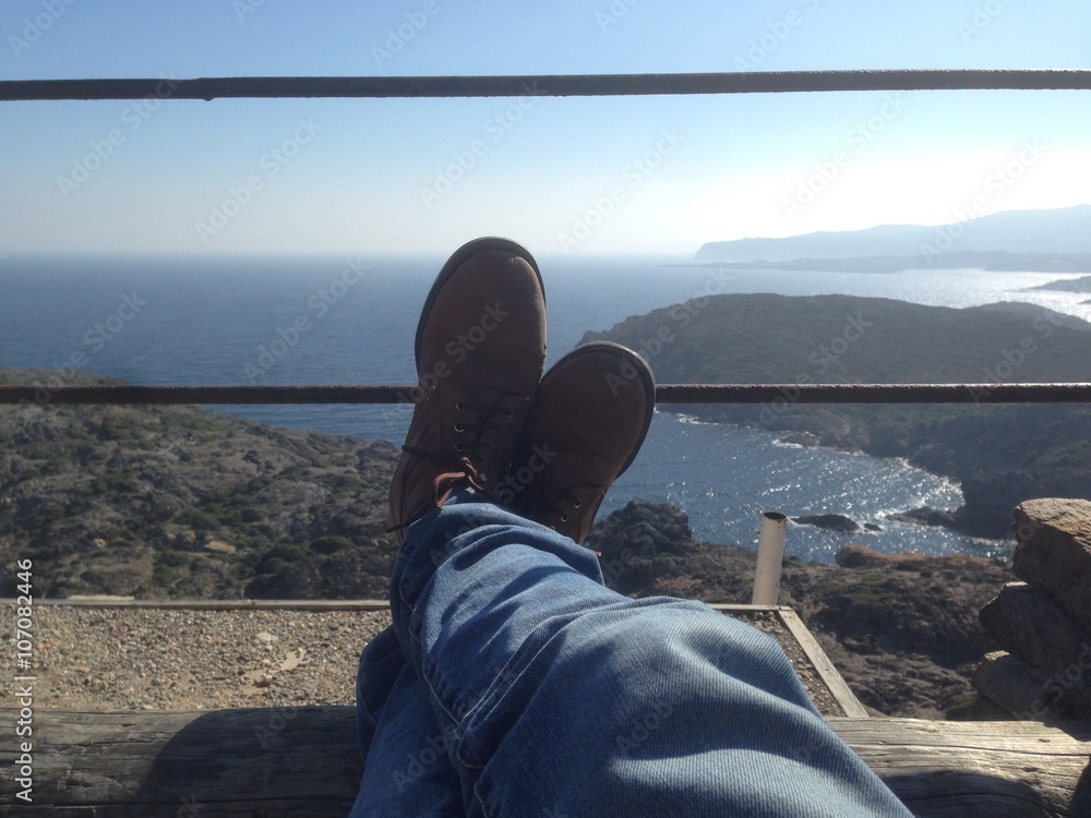 relaxing in the cap de creus watching the mediterranean sea - obrazy, fototapety, plakaty 
