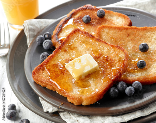 фотография French toast with butter and honey