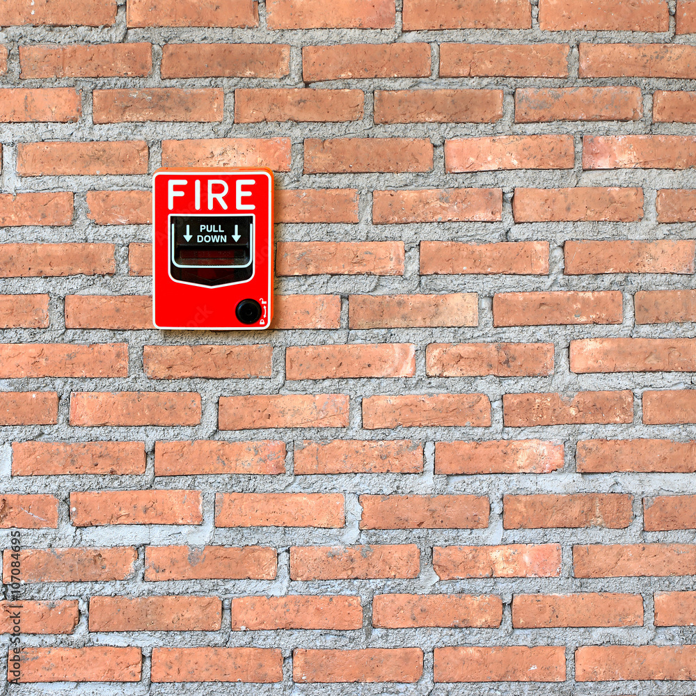 fire break glass alarm switch on brick wall background fire break glass alarm switch on brick wall background