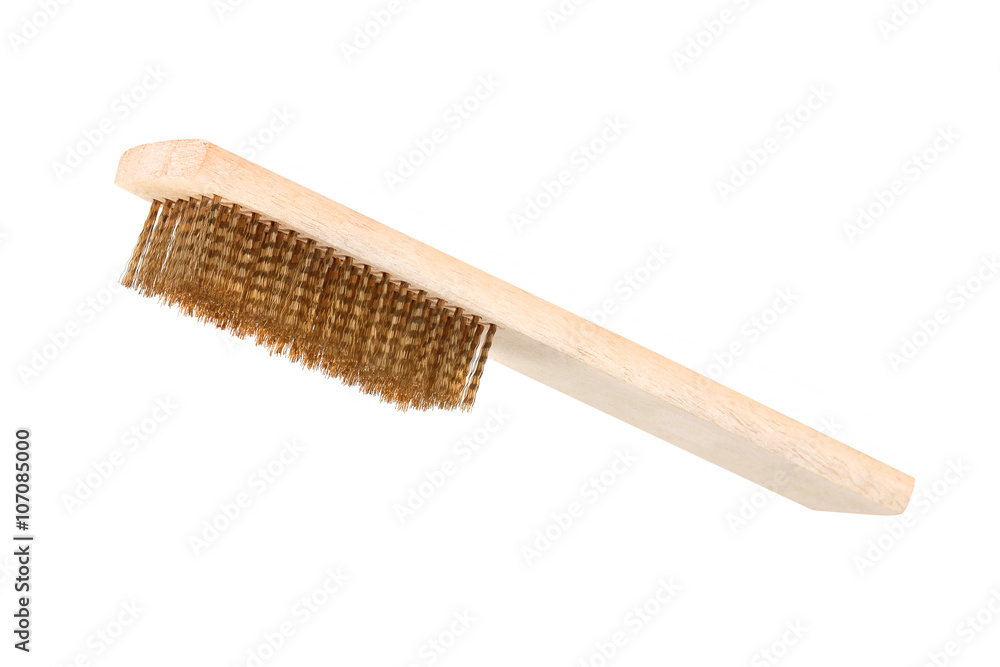 Close-up Brass brush with wooden handle isolated on white Close-up Brass brush with wooden handle isolated on white