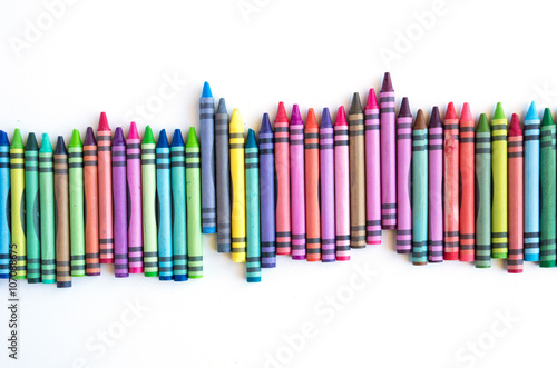 Crayons lined up isolated on white background
