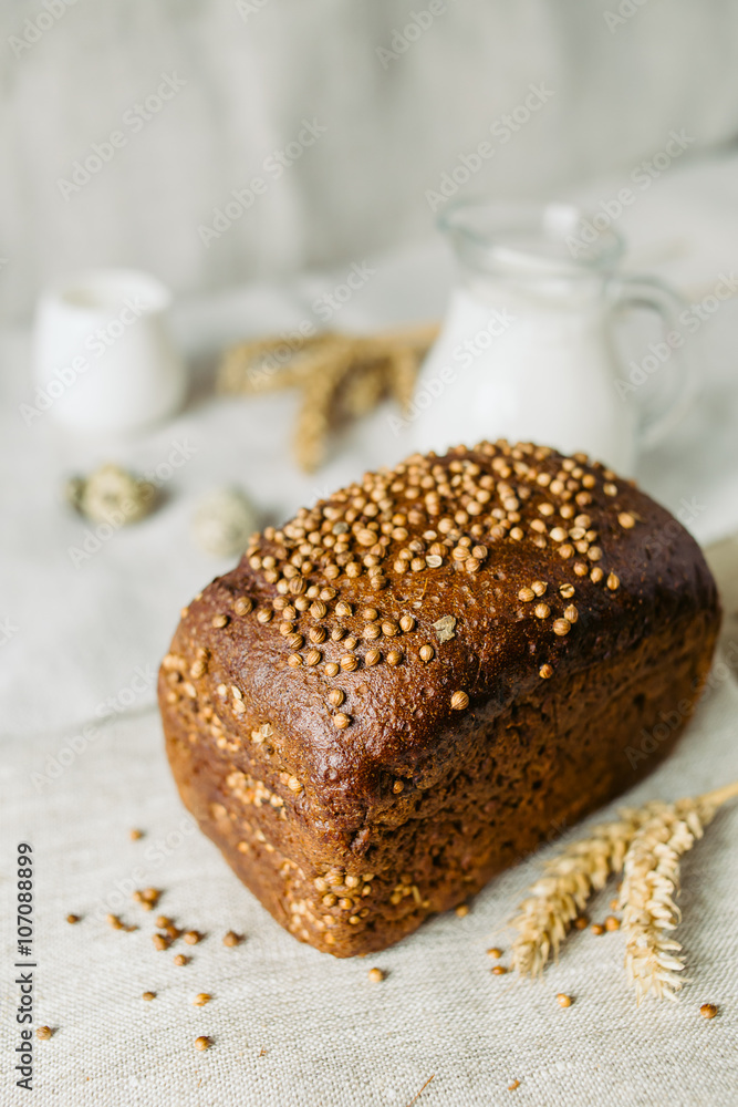 Sliced bread with fresh coriander and milk