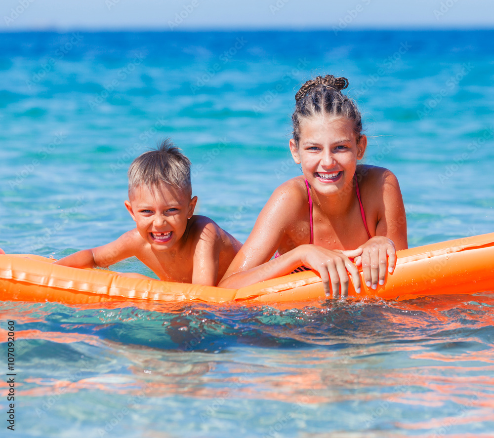 Kids playing in sea. Kids playing in sea.