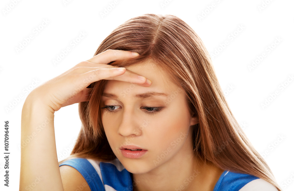 Teenage depression woman sitting on the floor Teenage depression woman sitting on the floor