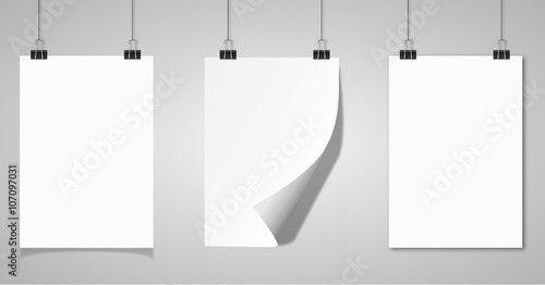 Three hanged paper sheet frames with clips and different shadows

