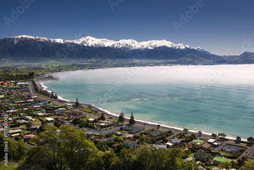 Kaikoura township with clearing morning fog. South Island,New Zealand photo