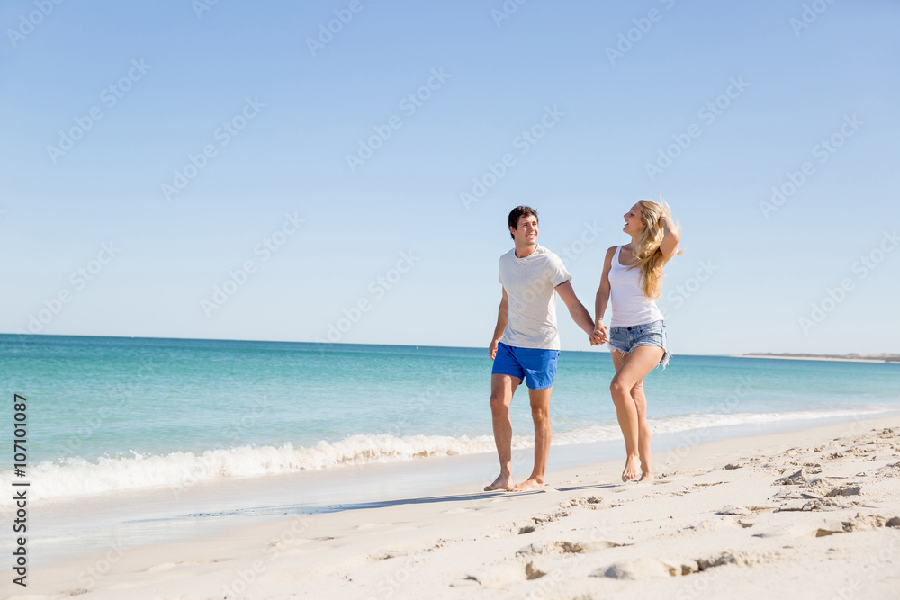 Romantic young couple on the beach