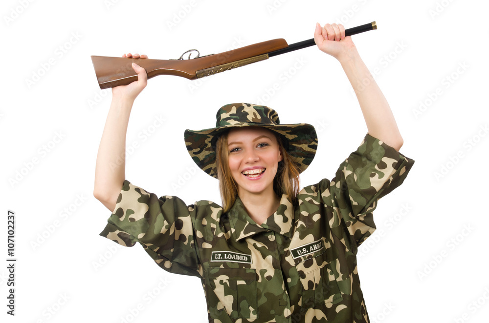 Girl in military uniform holding the gun isolated on white Girl in military uniform holding the gun isolated on white