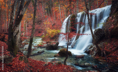Beautiful waterfall in autu...