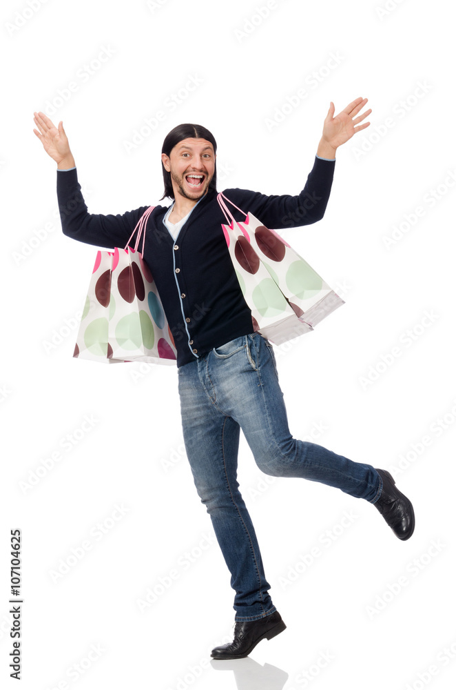 Young man holding plastic bags isolated on white