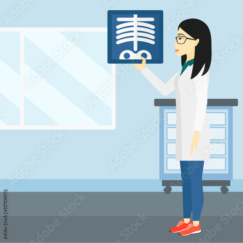 Doctor examining radiograph.